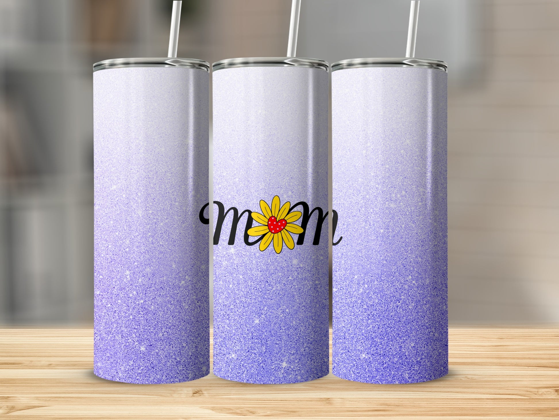 Three tall purple gradient tumblers with a yellow and red flower and "Mom" text.