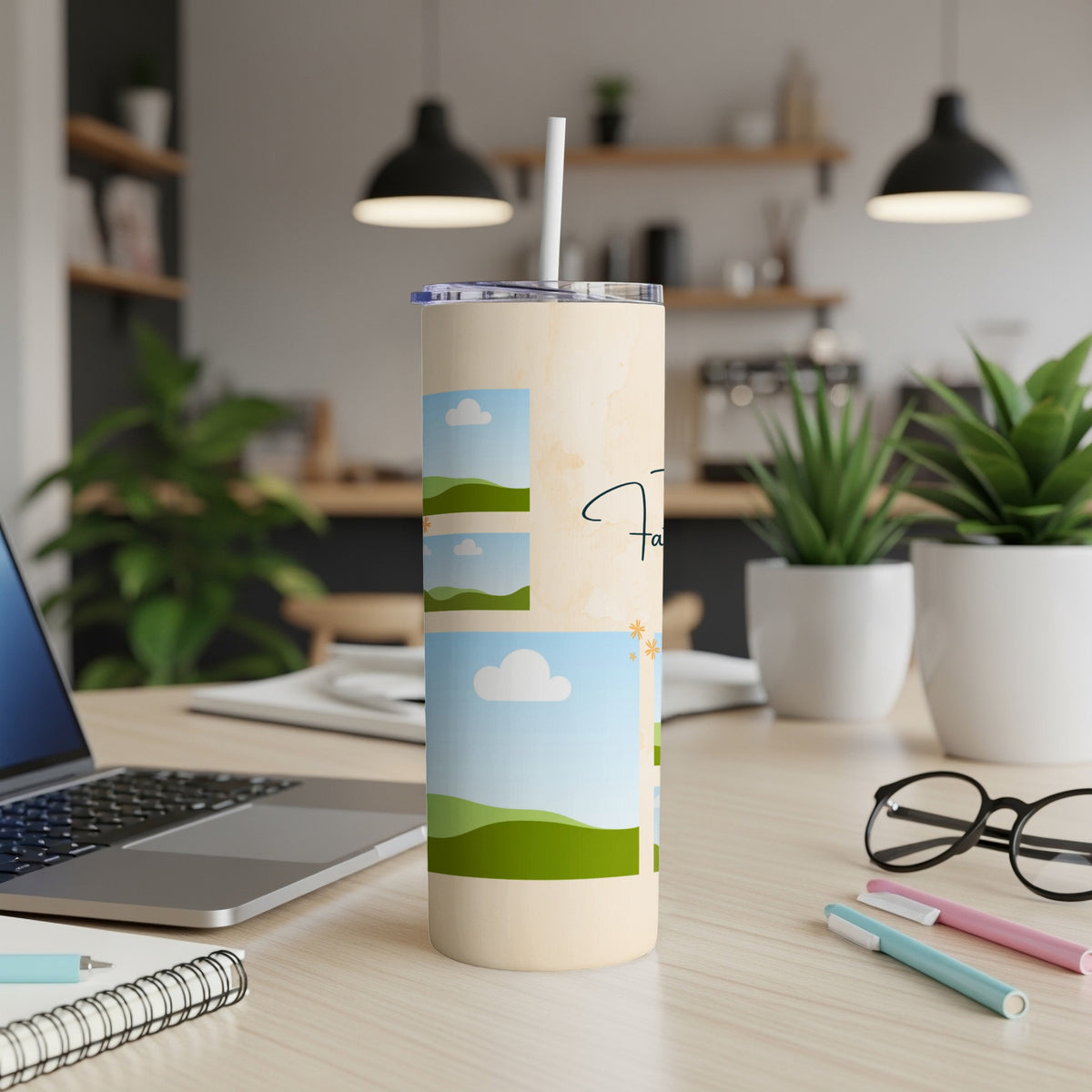 Cream tumbler with landscape images, clouds, and handwritten text.