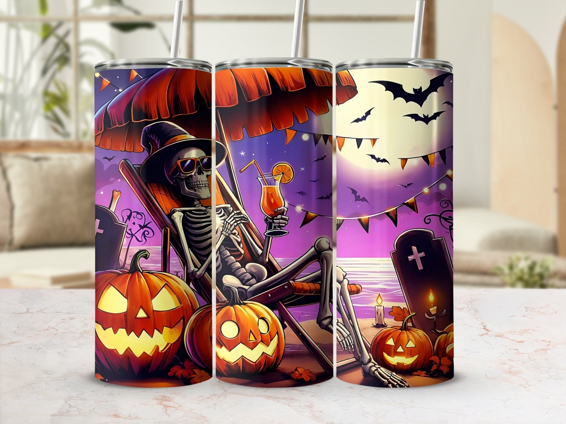 Halloween tumblers with skeleton, pumpkins, bats, and moon design.