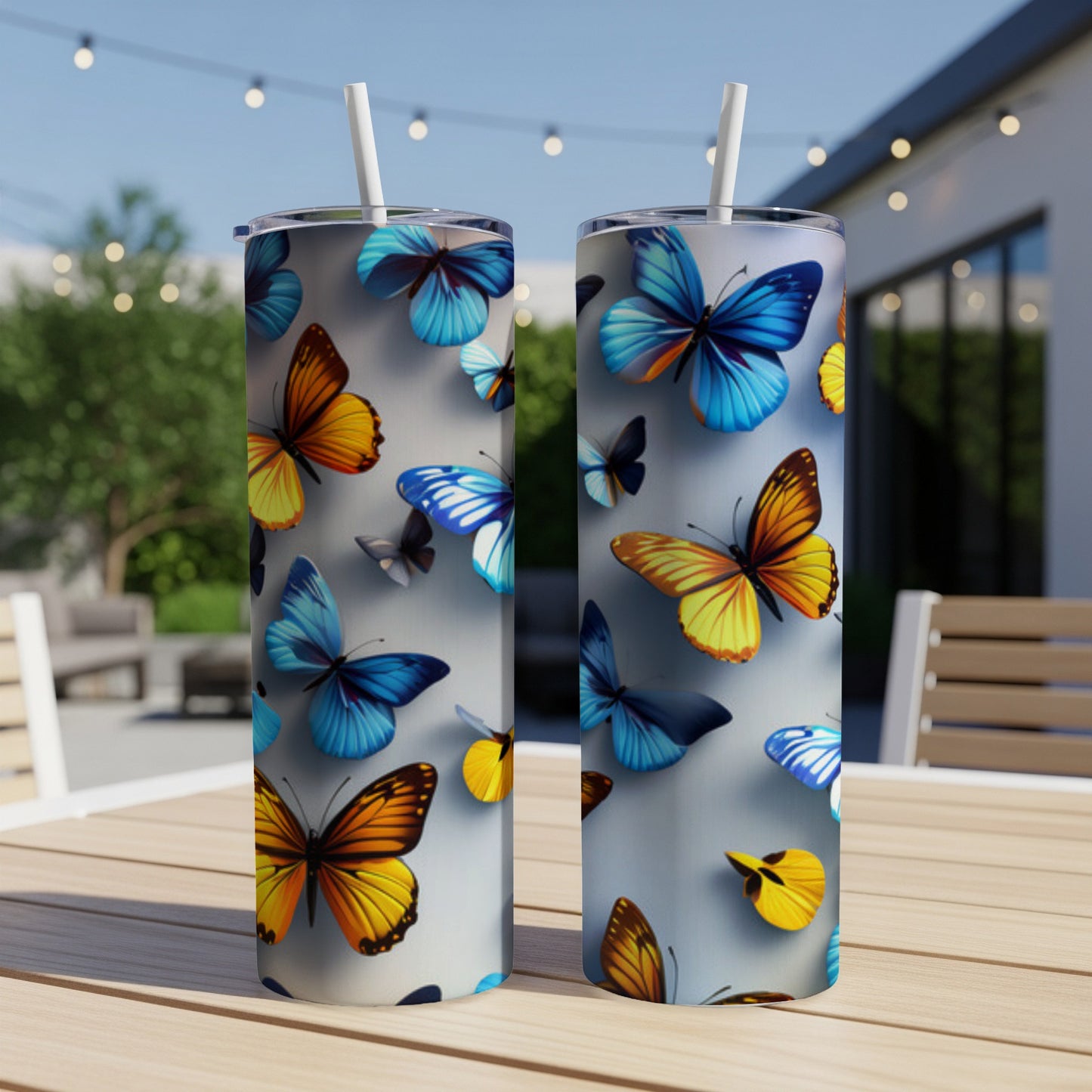 Two tall tumblers with colorful butterfly patterns.