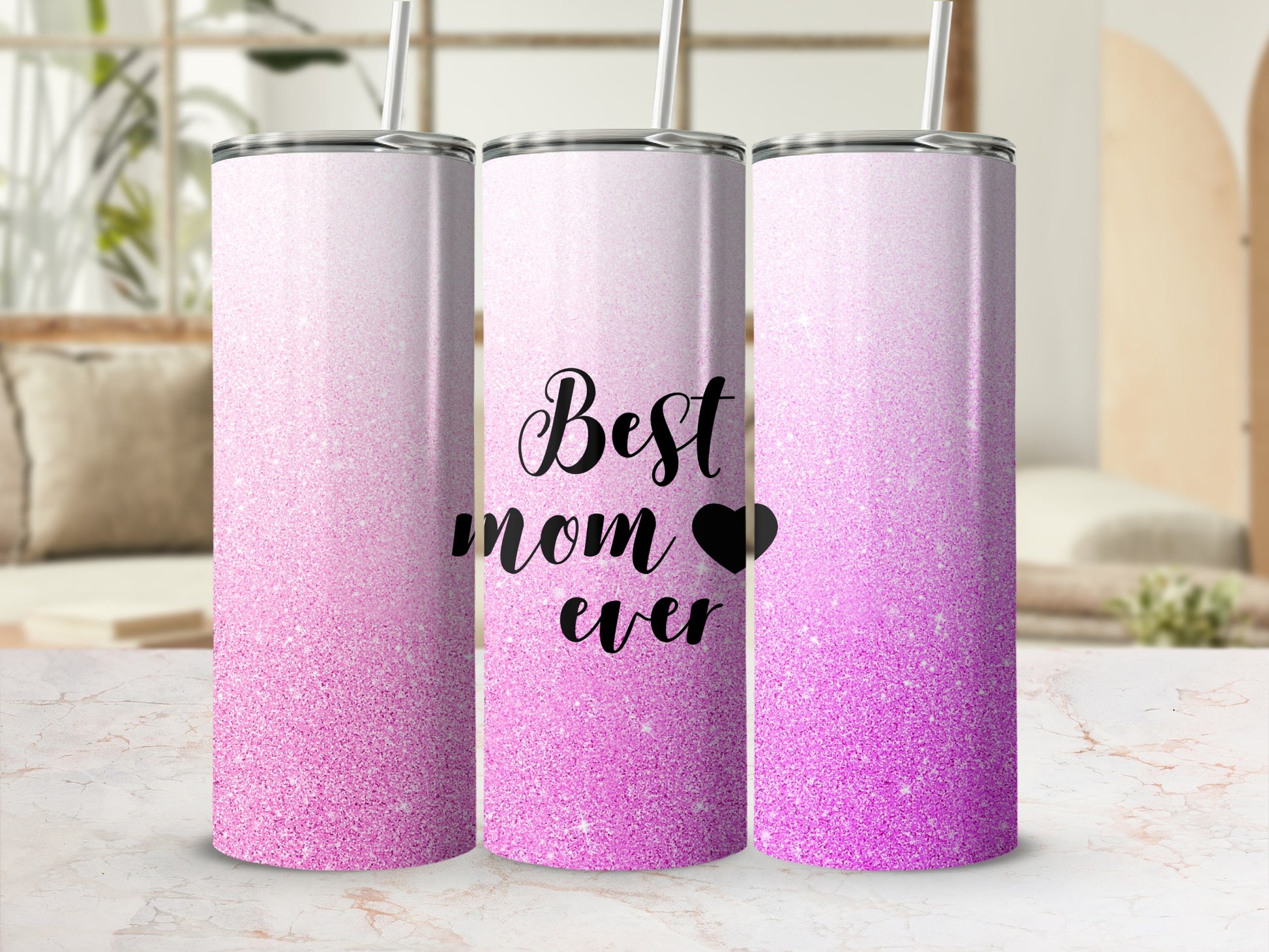 Pink glitter tumbler with "Best mom ever" text and a black heart.