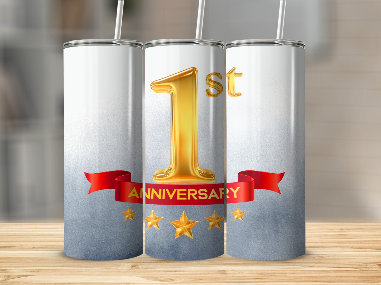 1st Anniversary tumbler with golden stars on red ribbon.