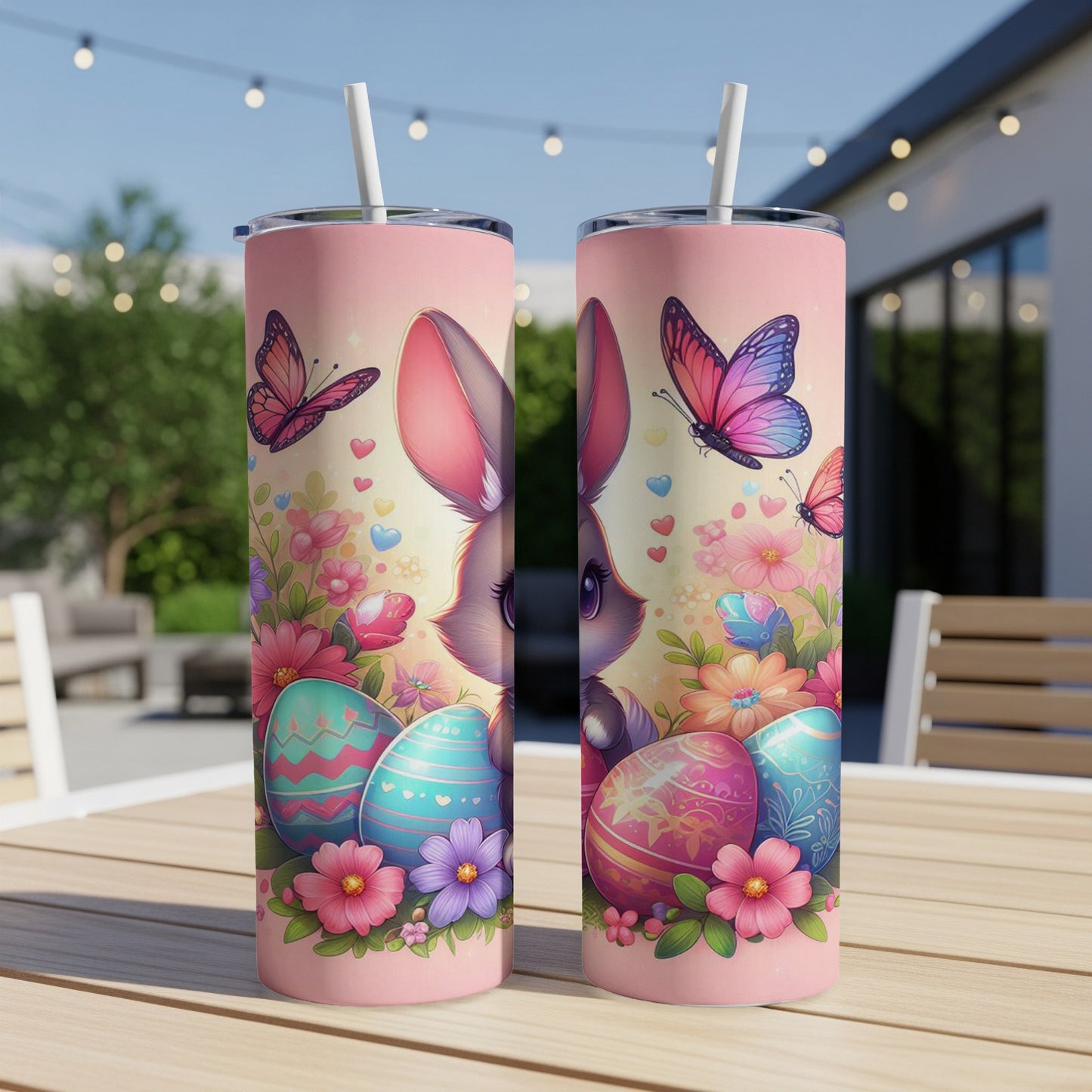 Pink Easter bunny and colorful eggs on a tumbler with butterflies.