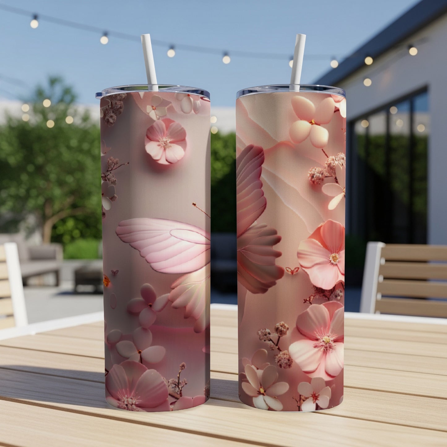Two tall tumblers with a pink butterfly and floral design.