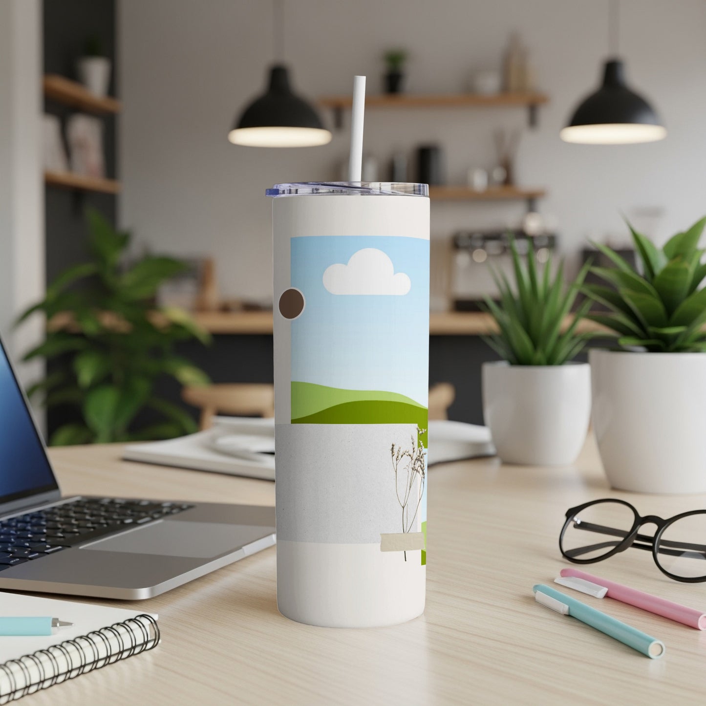 White tumbler with sky, clouds, hills, and dried flowers design.