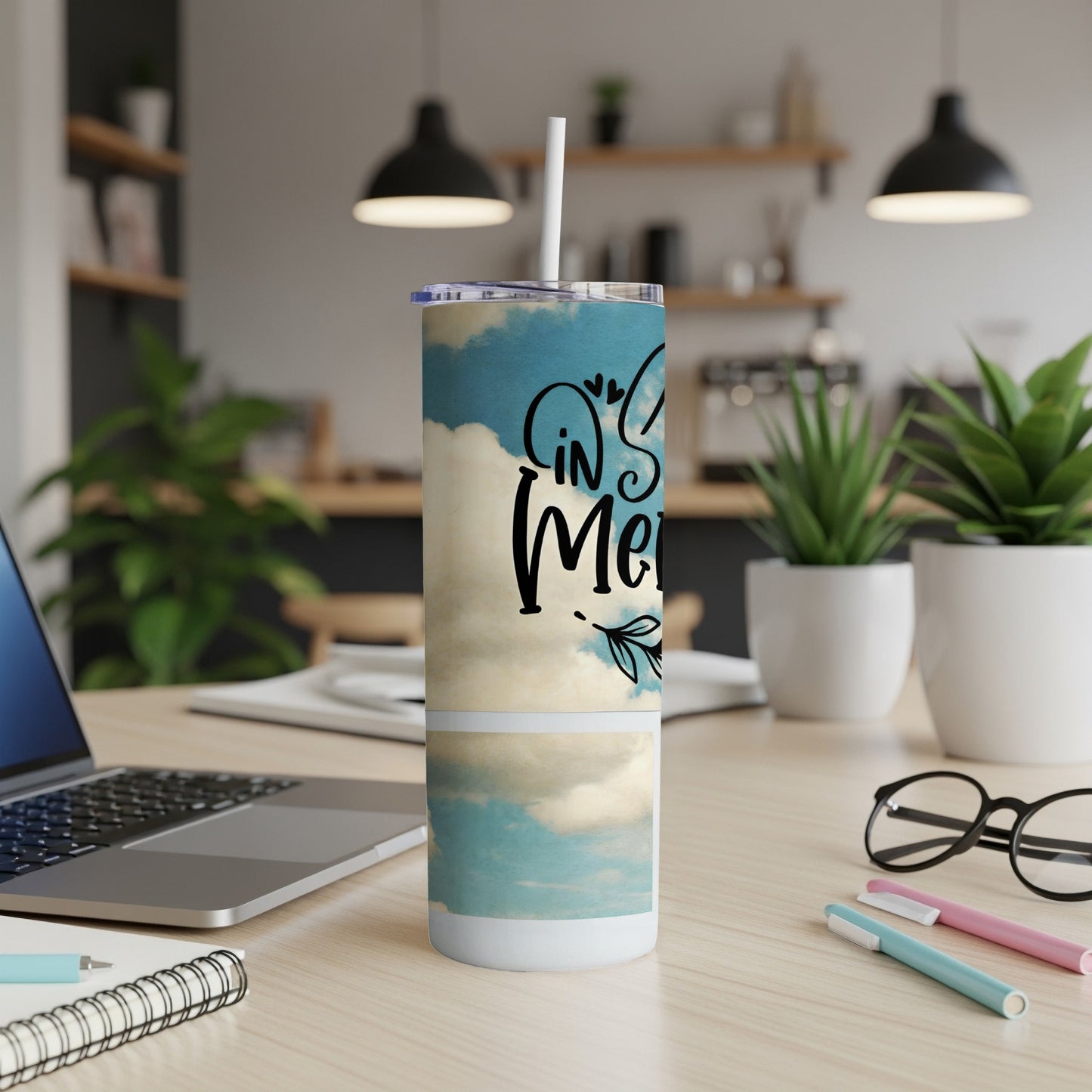 Tall tumbler with sky and cloud pattern and text "In My".