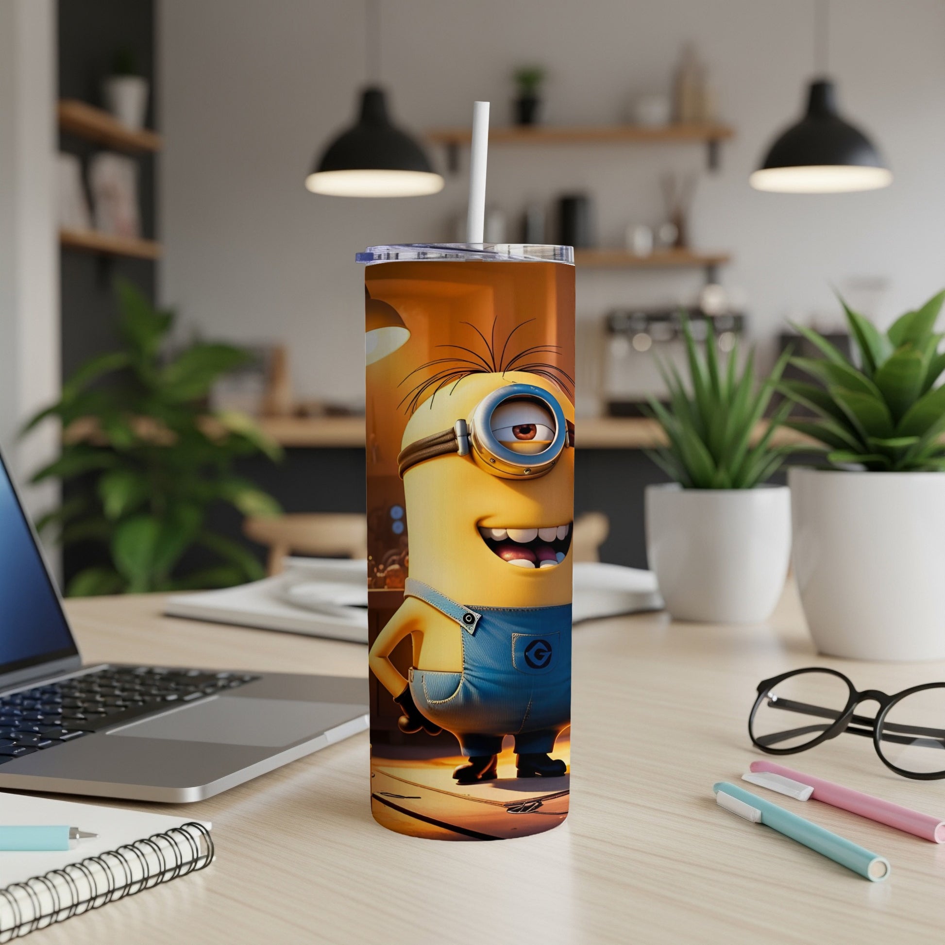 Minion character on a cylindrical tumbler with a straw.