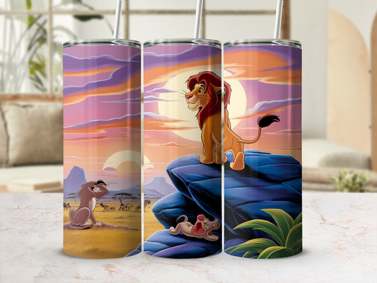 The Lion King characters Simba, Nala, and cub on a sunset savanna landscape.