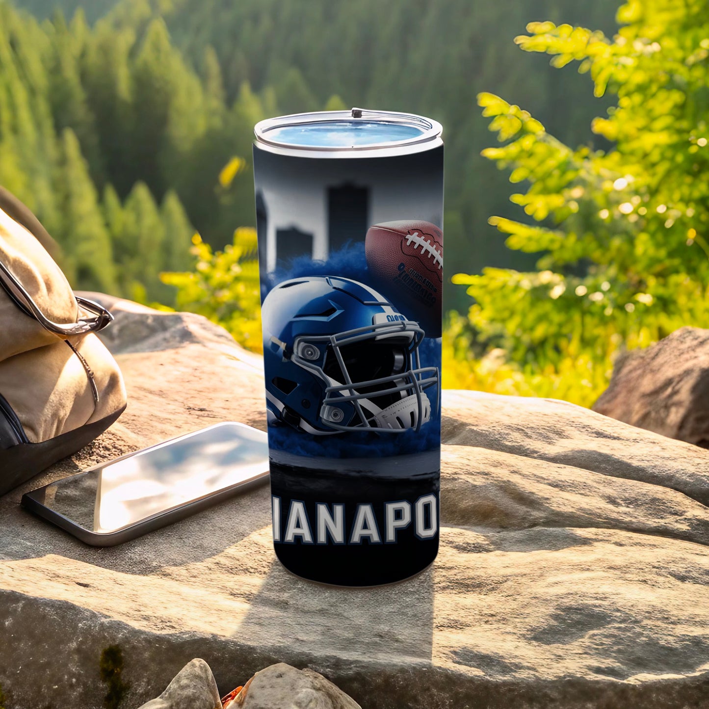 Blue and white Indianapolis Colts helmet and football on a tumbler.