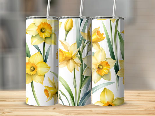 Three tumblers with a watercolor daffodil floral design.