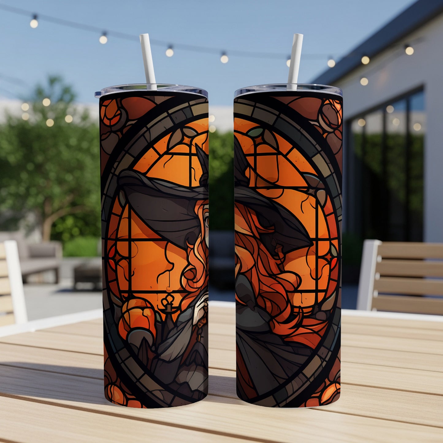 Two tumblers with a stained glass witch and pumpkin design.