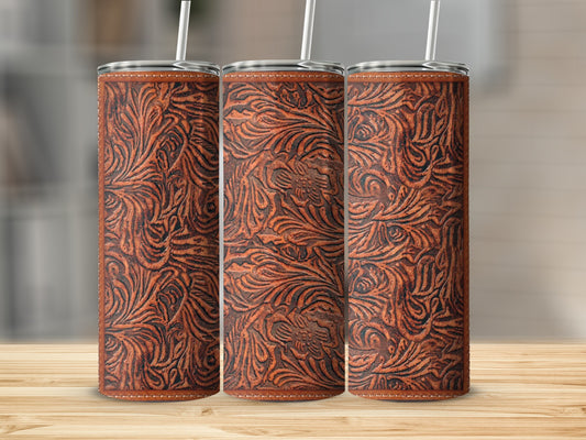 Three tumblers with brown embossed floral leather texture and white straws.