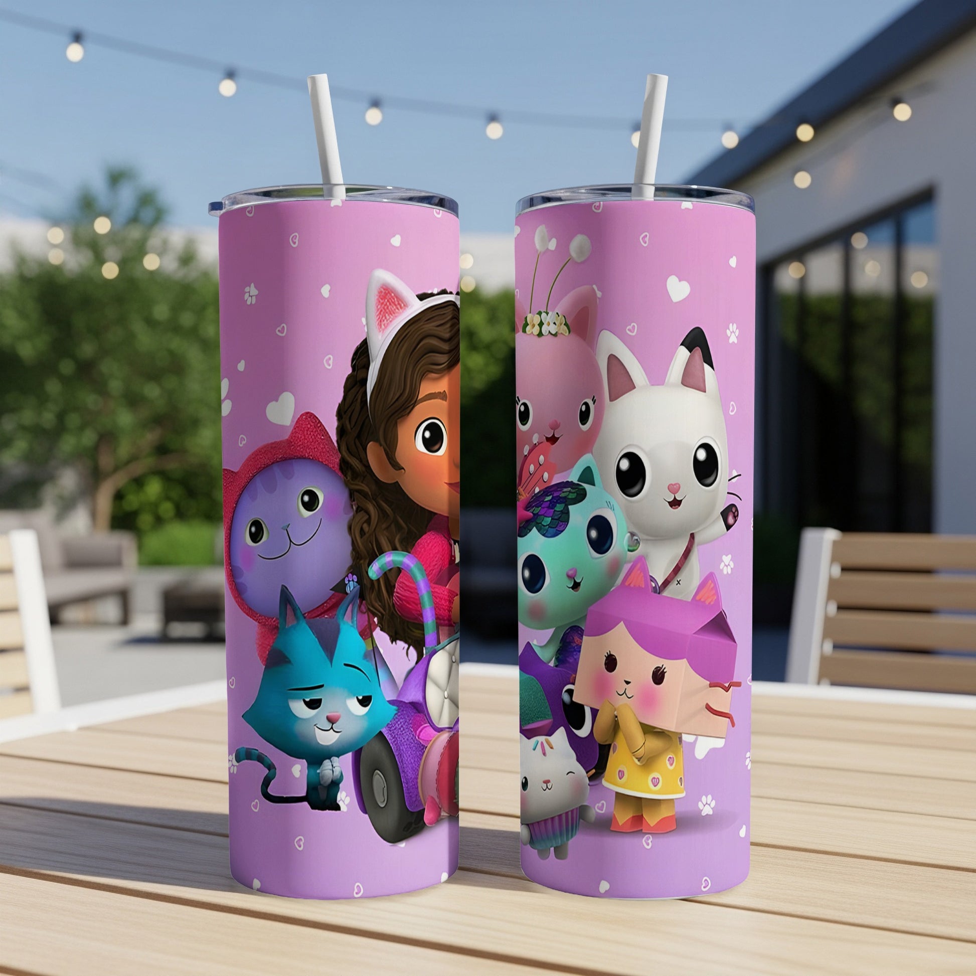 Gabby's Dollhouse characters on purple tumblers with white straws.