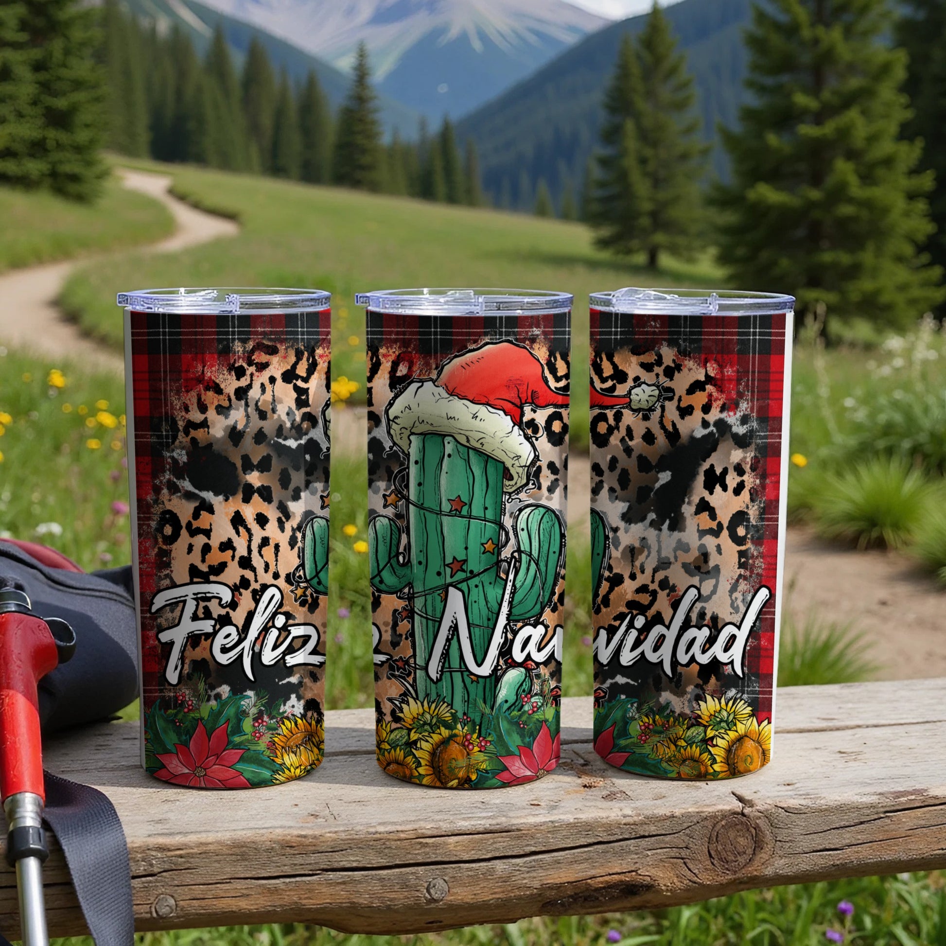 Three tumblers with Feliz Navidad cactus design and Santa hat.