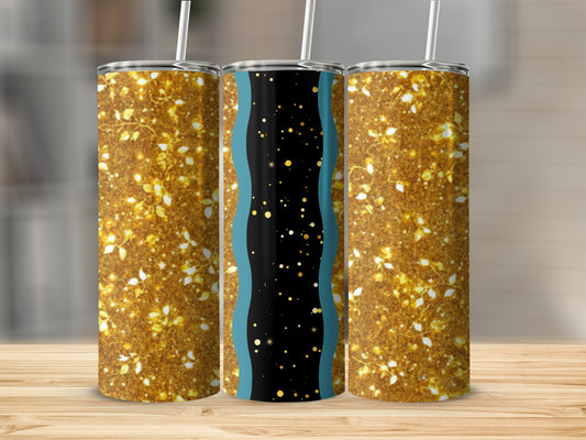 Gold glitter tumbler with blue wavy stripe and white straw.
