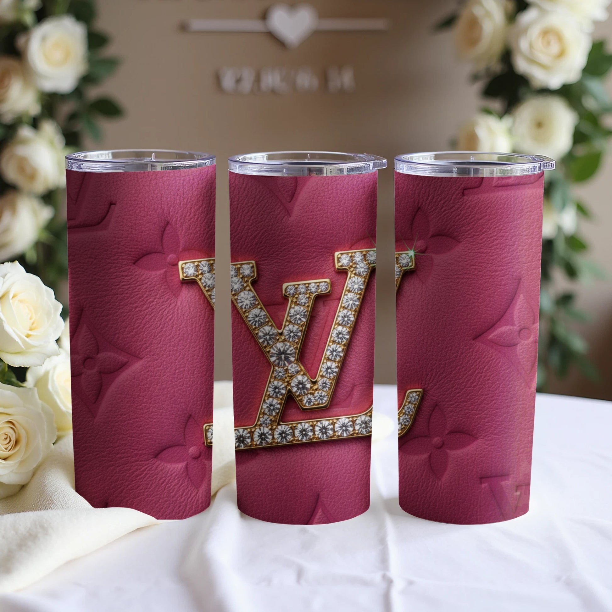 Pink Tumbler Featuring Embossed Monogram and Logos