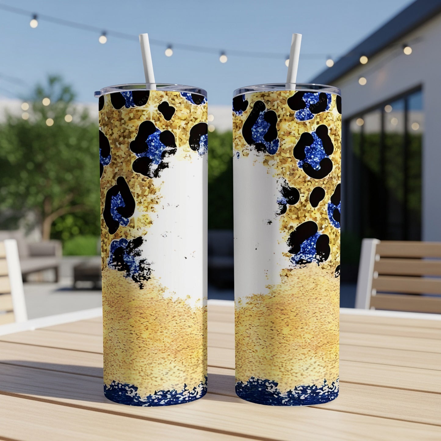 Two tall tumblers with leopard print and glitter gold design.