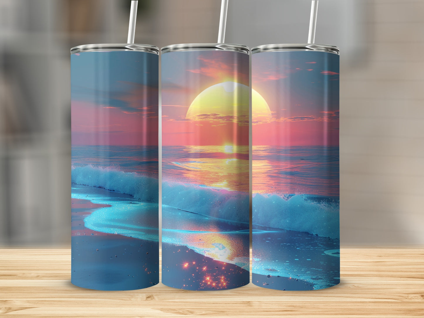 Three tumblers with sunset ocean wave design.