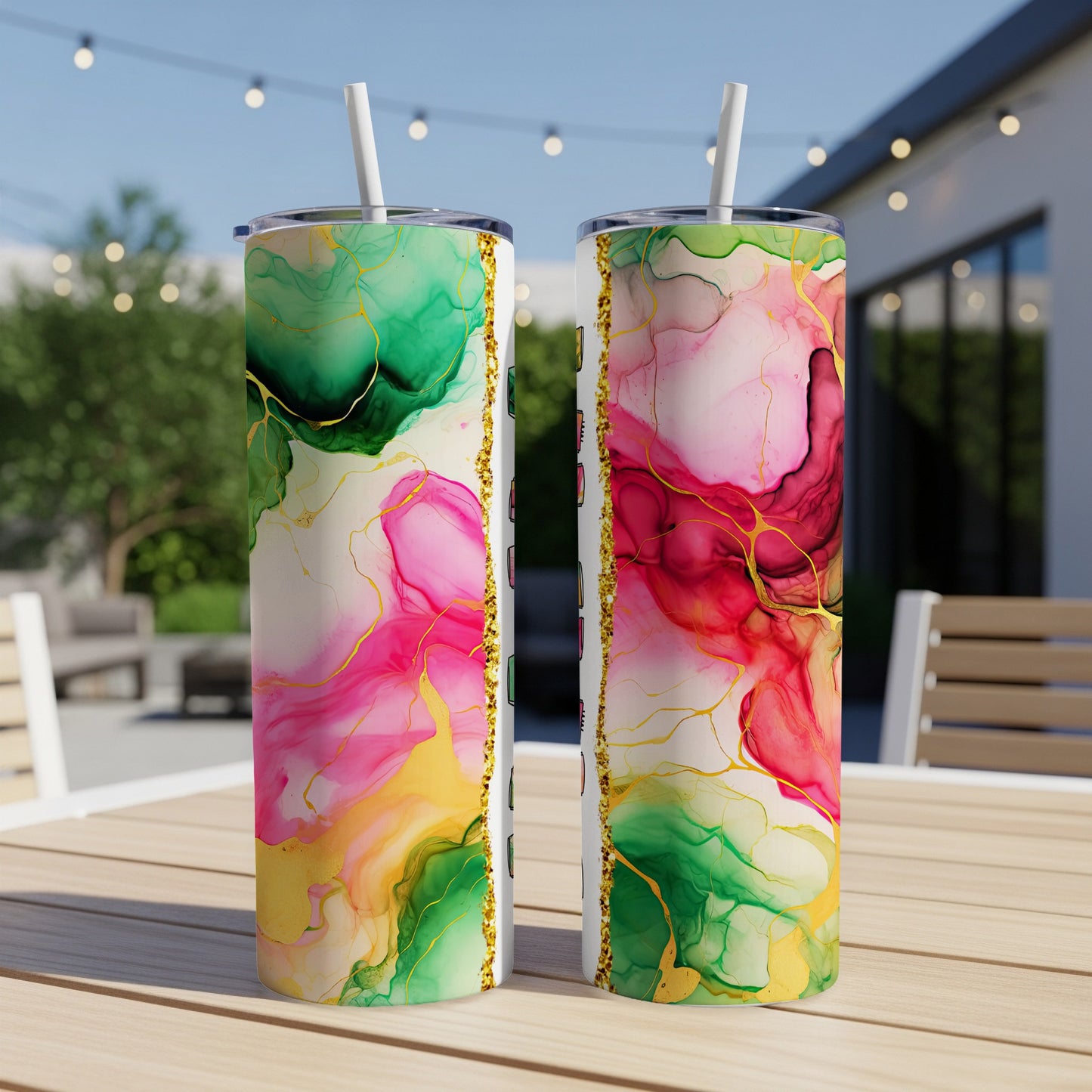 Two tumblers with abstract pink, green, and gold watercolor design.