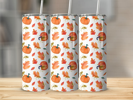 Three tumblers with a fall pumpkin and leaf pattern.