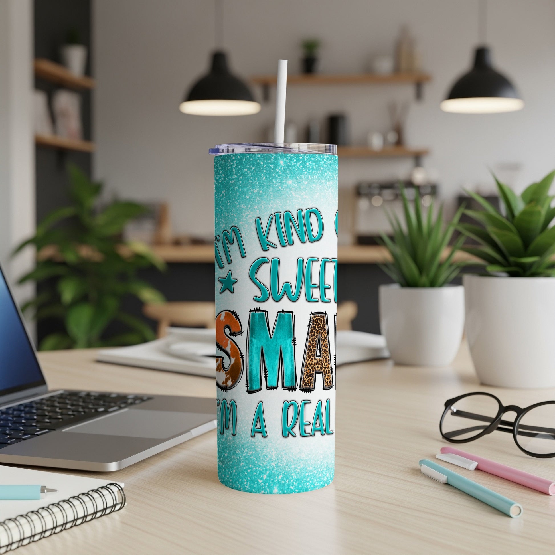 Turquoise glitter tumbler with "I'm Kind, Sweet, Smart, & a Real handful" text.