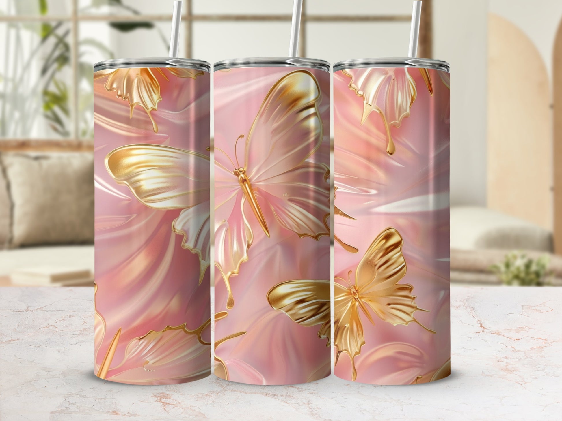 Pink tumbler with gold butterflies and abstract background.