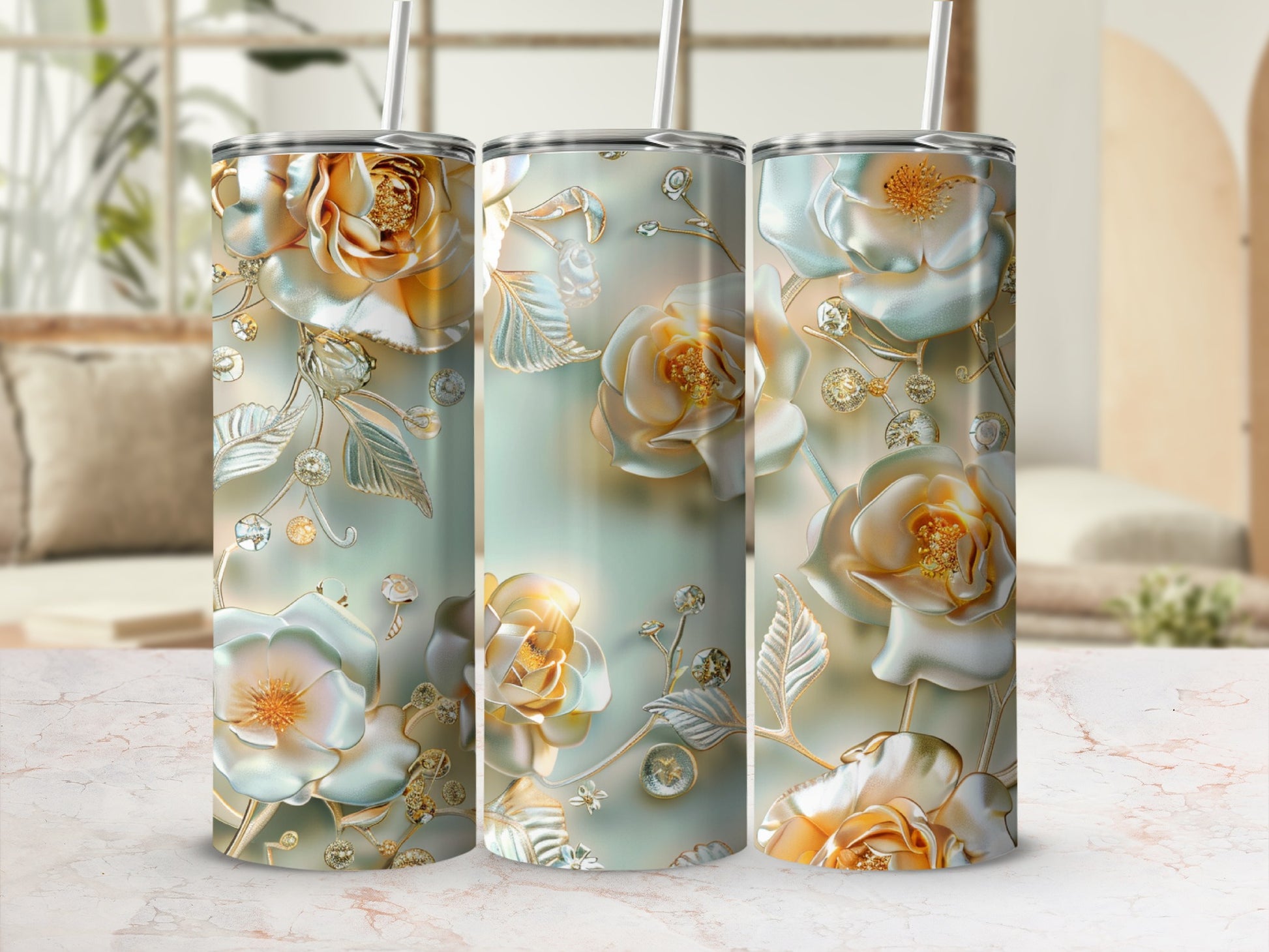 Three iridescent tumblers with embossed floral designs and gold accents.