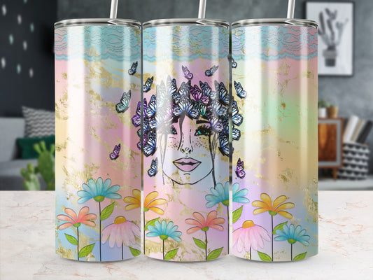 Feminine face with butterflies and flowers on pastel marbled tumbler.