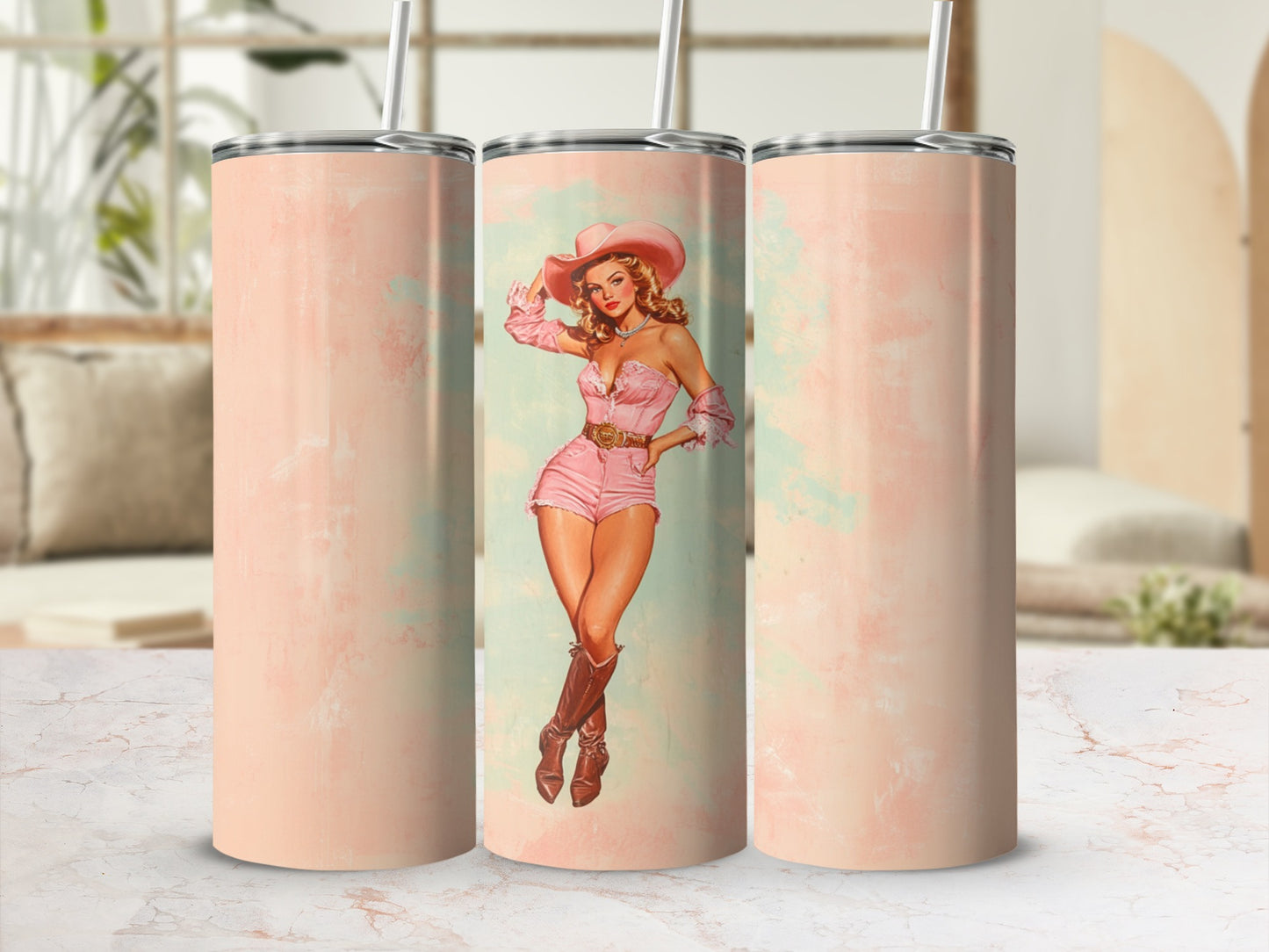 Pink cowgirl pin-up art on a tall, slim tumbler with straw.