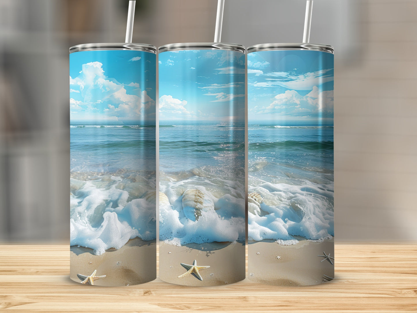 Three tumblers featuring a beach scene with shells and starfish.
