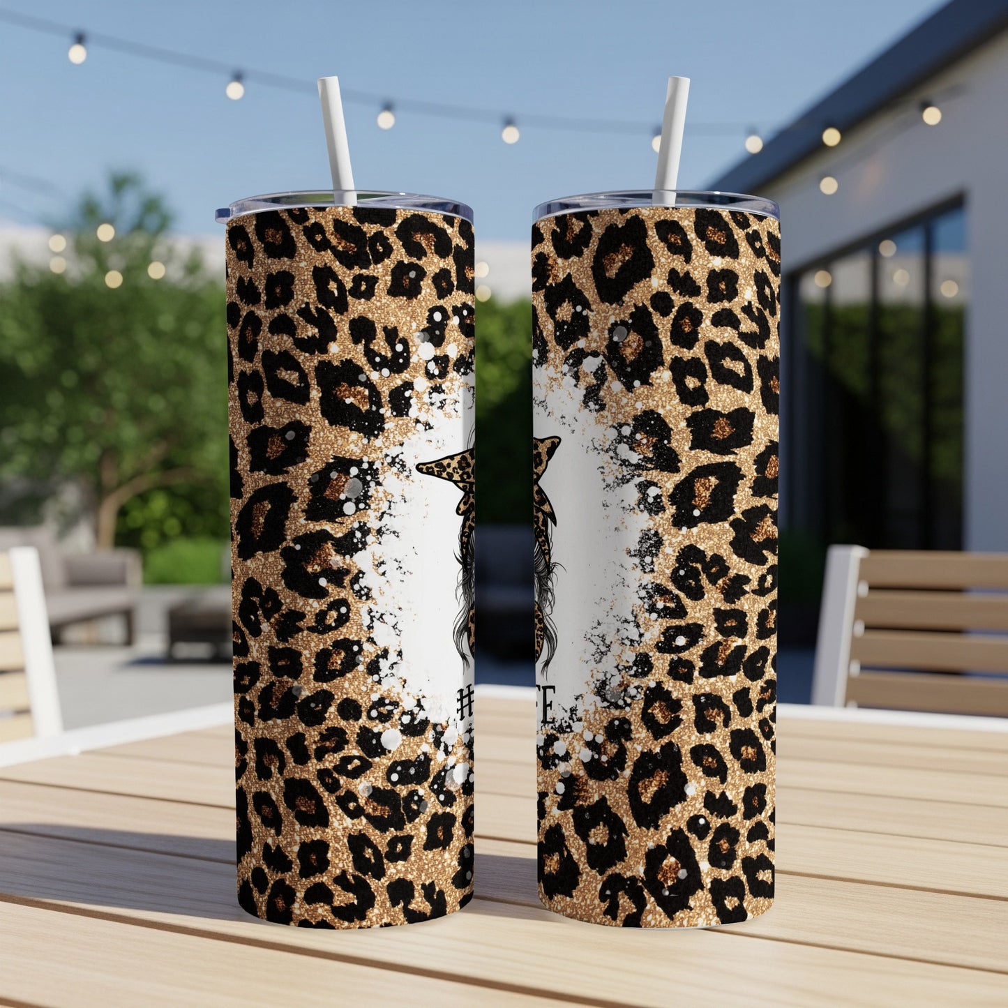 Two tall tumblers with leopard print and distressed white accents.