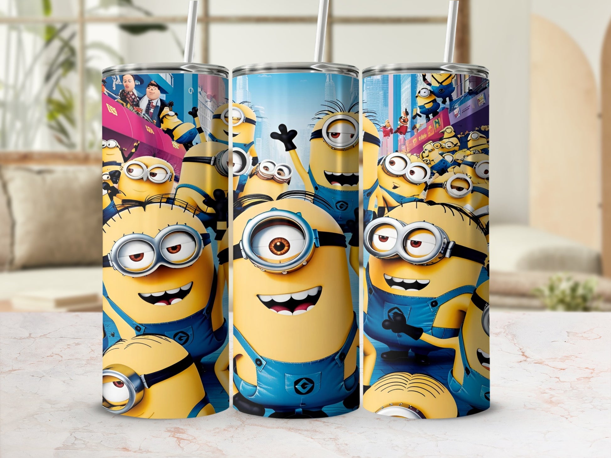 Three Minions from Despicable Me on blue and yellow tumblers.