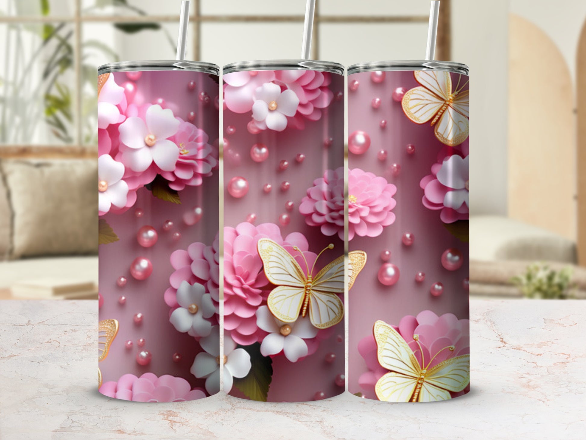 Pink tumbler with white and pink flowers and gold butterflies.