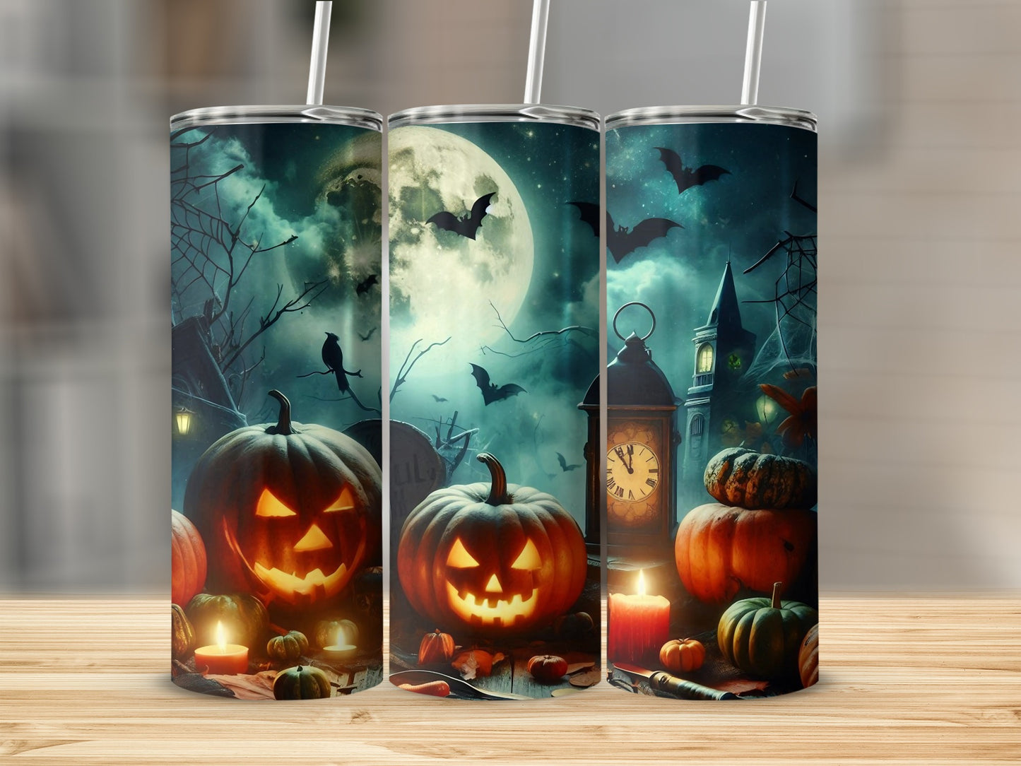 Halloween tumblers with glowing jack-o'-lanterns, bats, and a full moon.