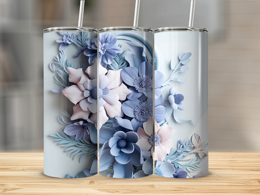 Three tumblers with pastel floral designs in shades of blue and pink.