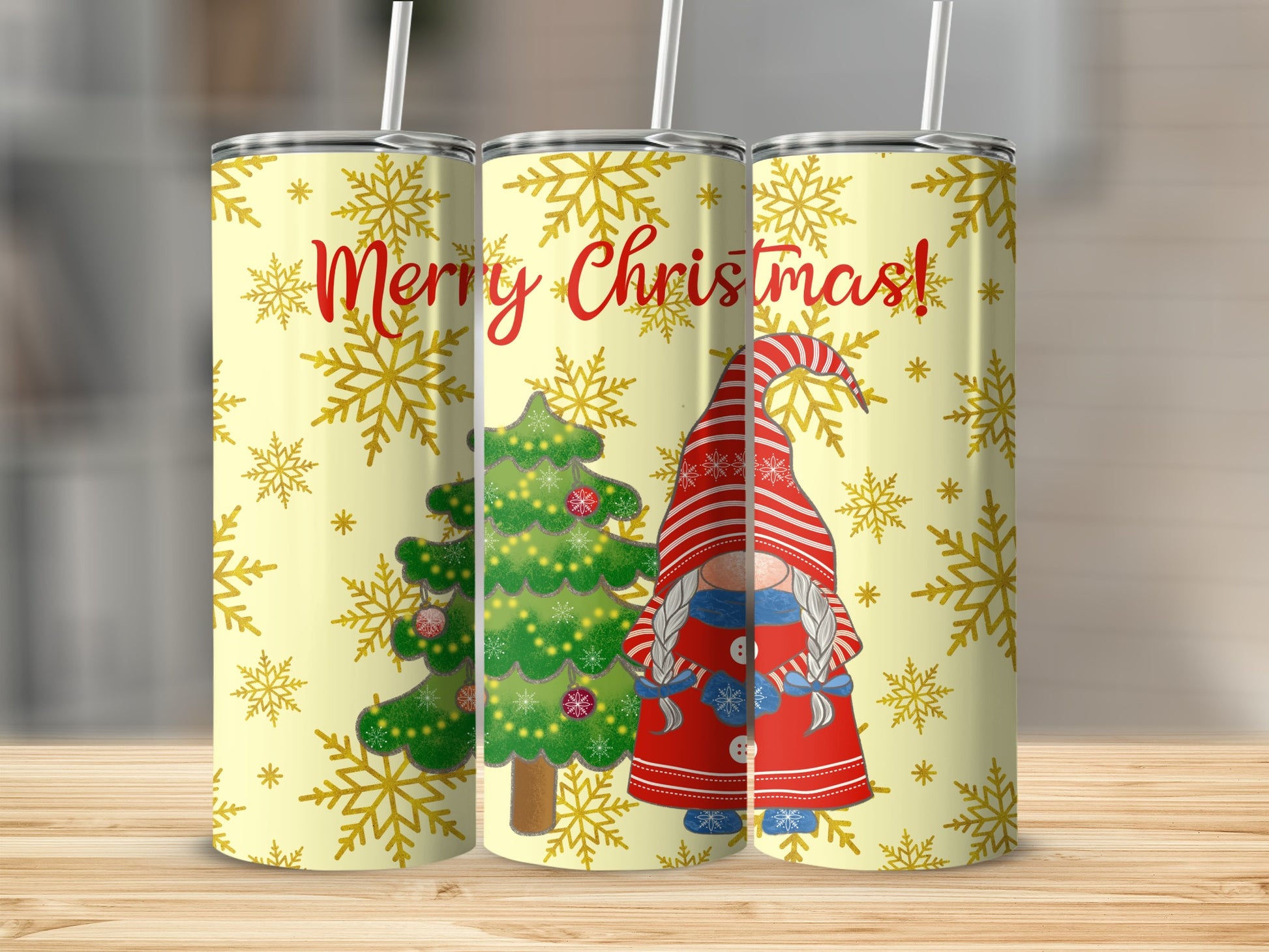 Three tumblers with a gnome, Christmas tree, and "Merry Christmas" text.
