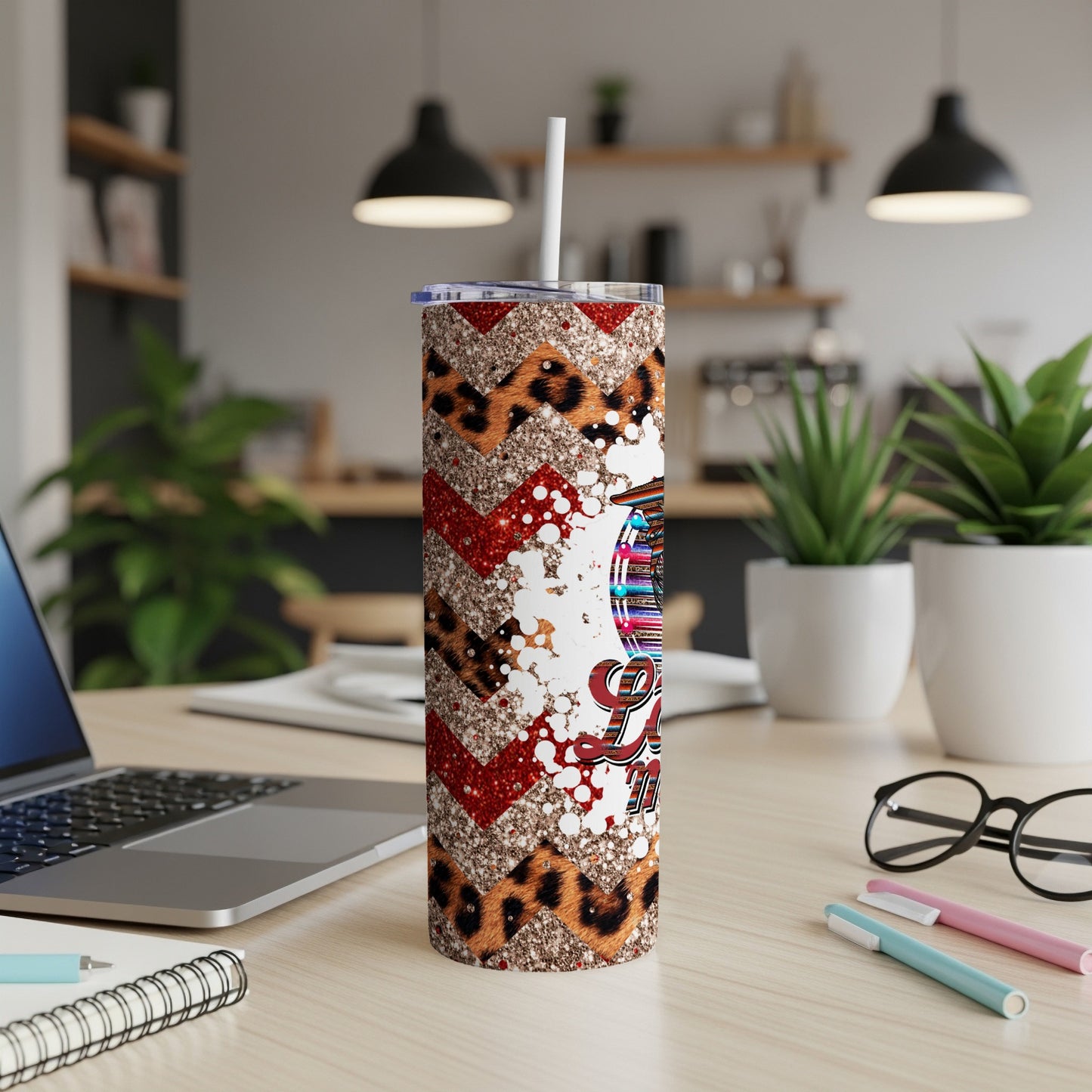 Patterned tumbler with leopard print and glittery red chevron.