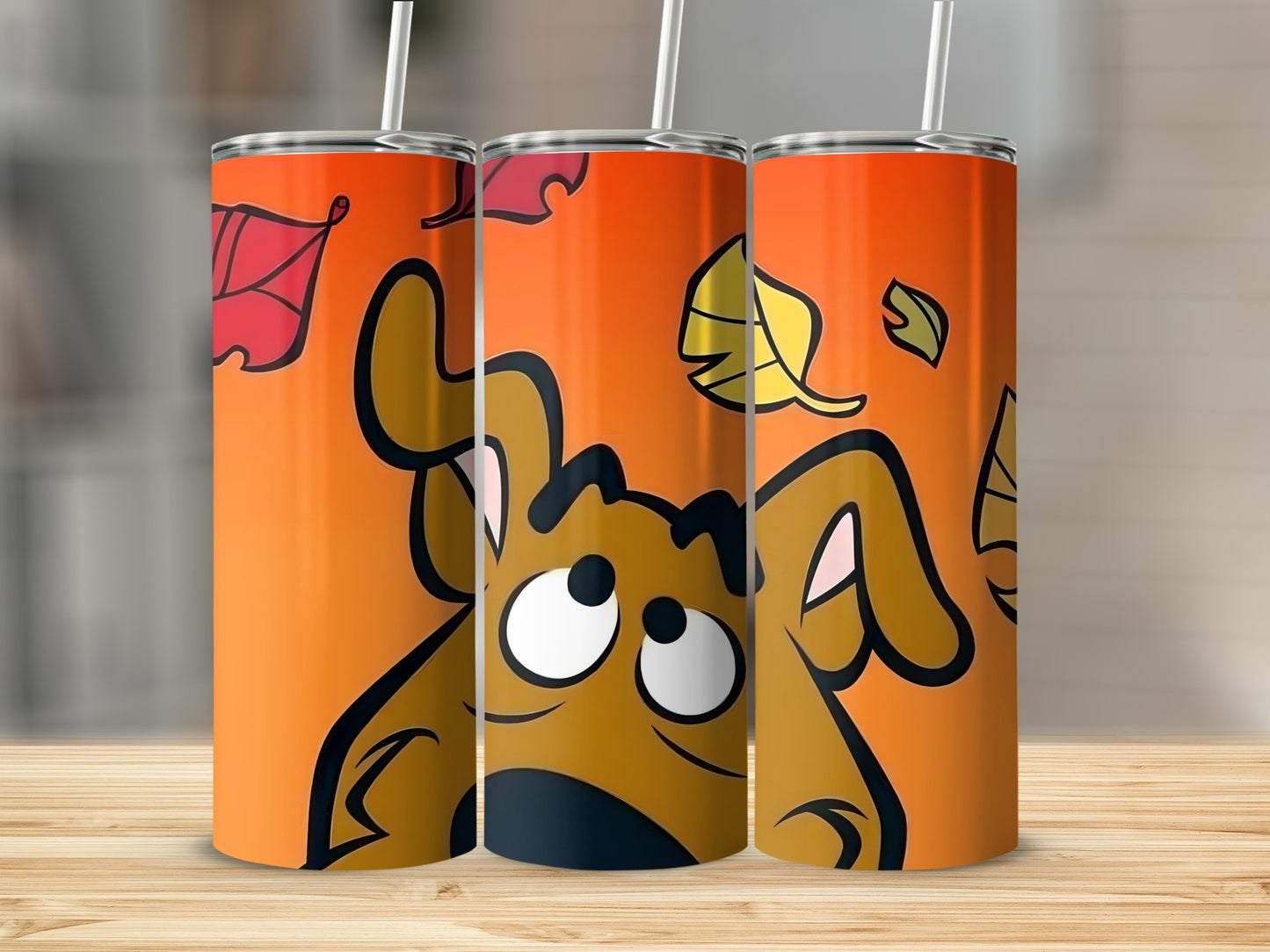 Scooby-Doo themed tumbler with autumn leaves on orange background.