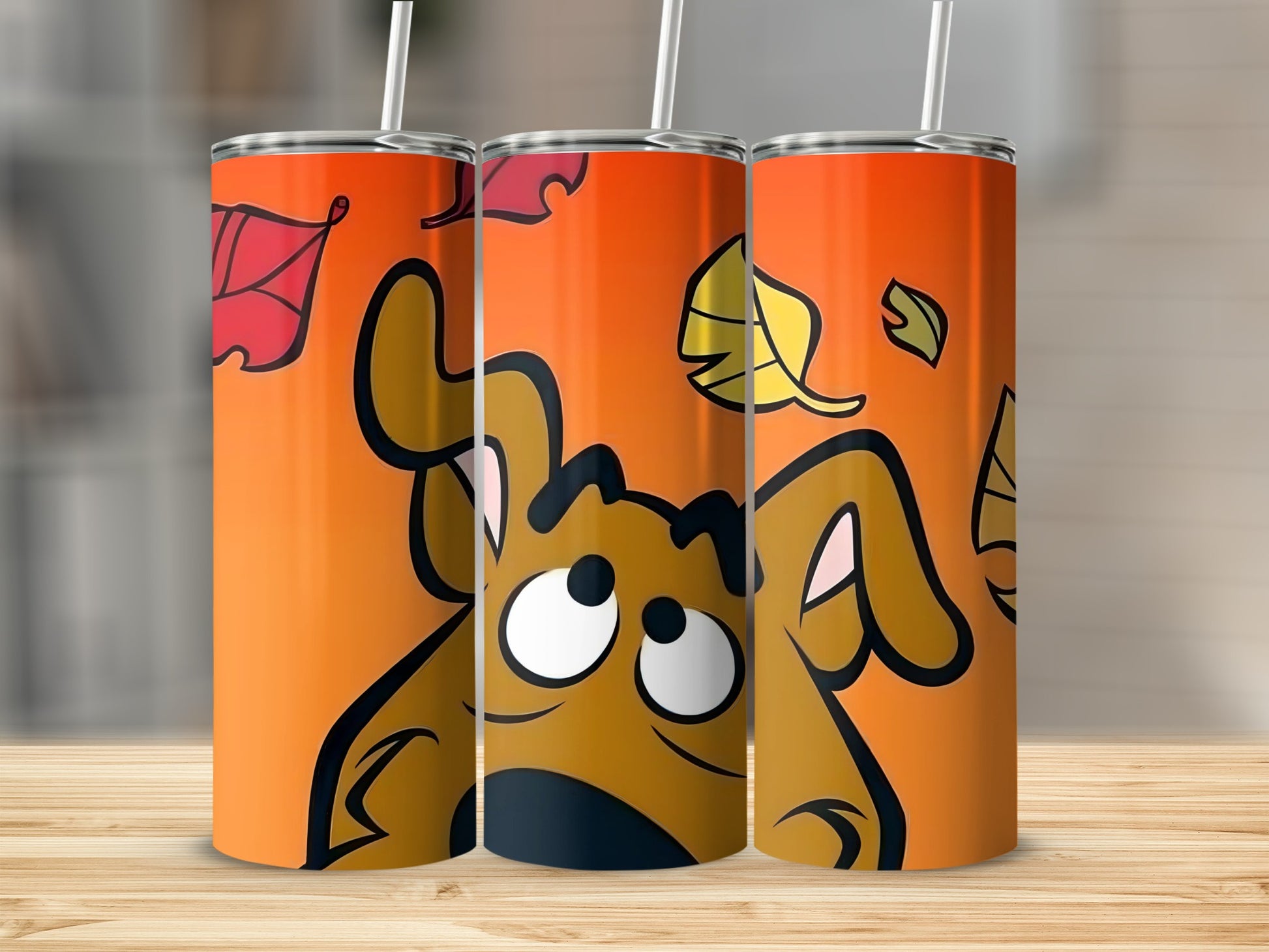 Scooby-Doo themed tumbler with autumn leaves on orange background.