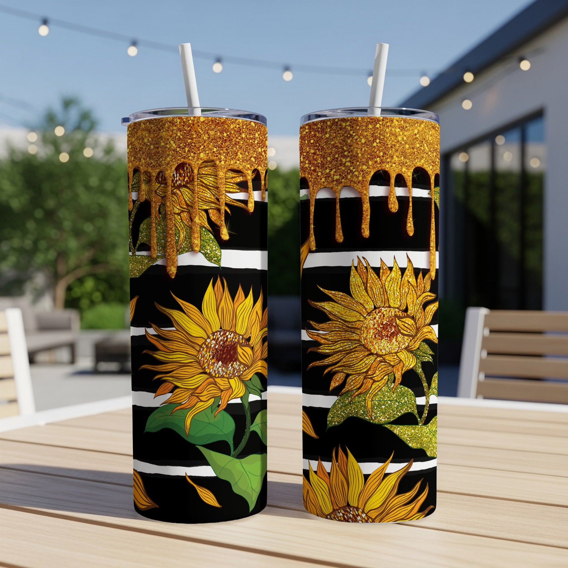 Two tumblers with sunflowers, black and white stripes, and gold glitter accents.