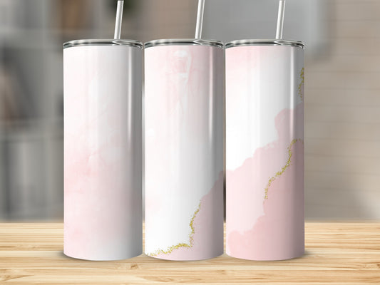 Three pink and white marble tumblers with gold glitter accents.