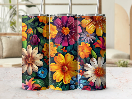 Three tumblers with colorful floral patterns and metallic accents.