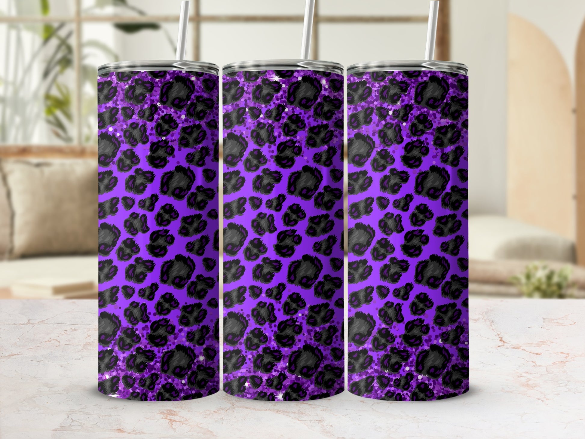 Purple tumbler with black and silver leopard print pattern.