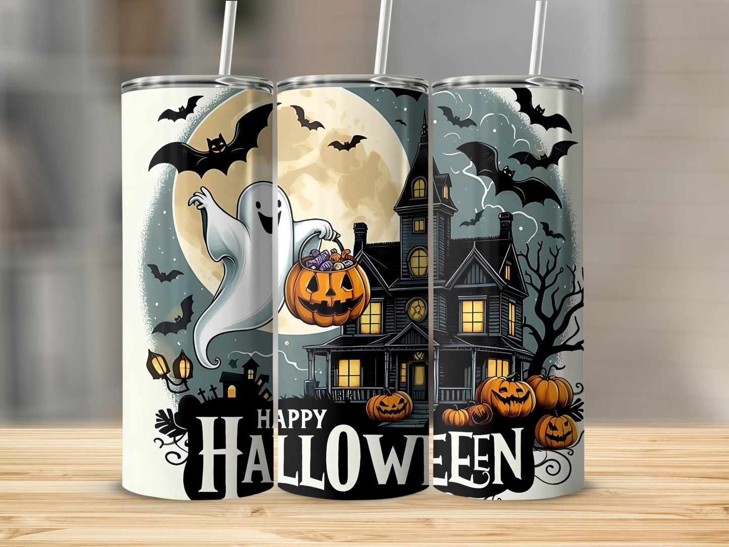 Three tumblers with a Halloween theme featuring a haunted house, ghost, bats, and pumpkins.