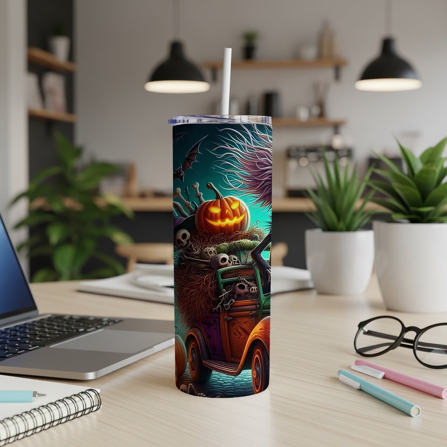 Tumbler with Halloween theme: truck filled with pumpkins, skulls, and bats.