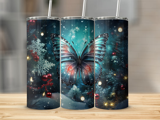 Butterfly and Christmas tree on a festive tumbler.