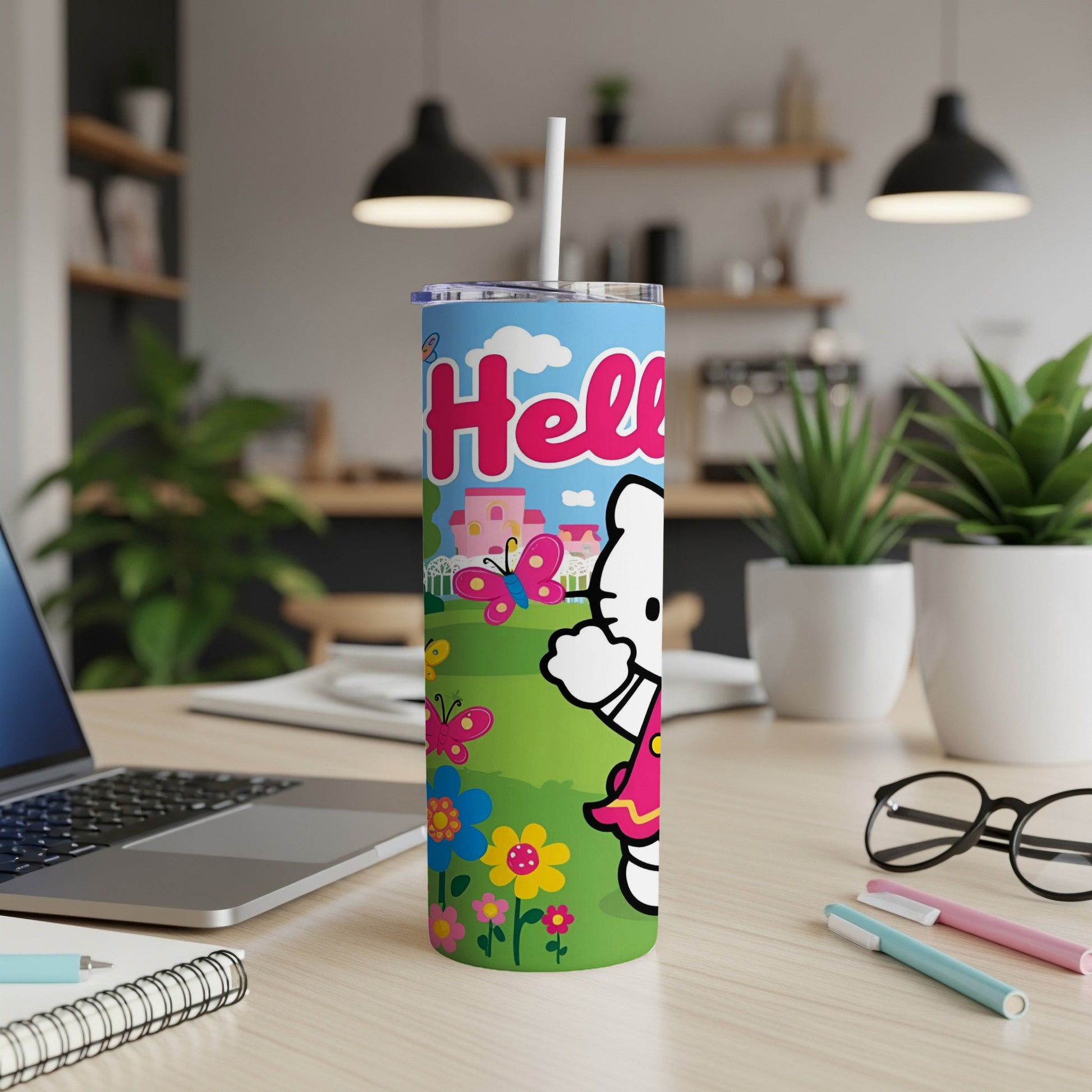 Hello Kitty tumbler with colorful butterflies, flowers, and building graphics.