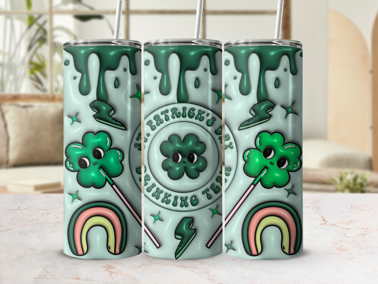 Three St. Patrick's Day themed tumblers with shamrocks, lightning bolts, and rainbows.