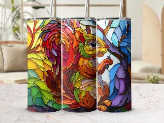 Stained glass squirrel artwork on three tumblers with straws.