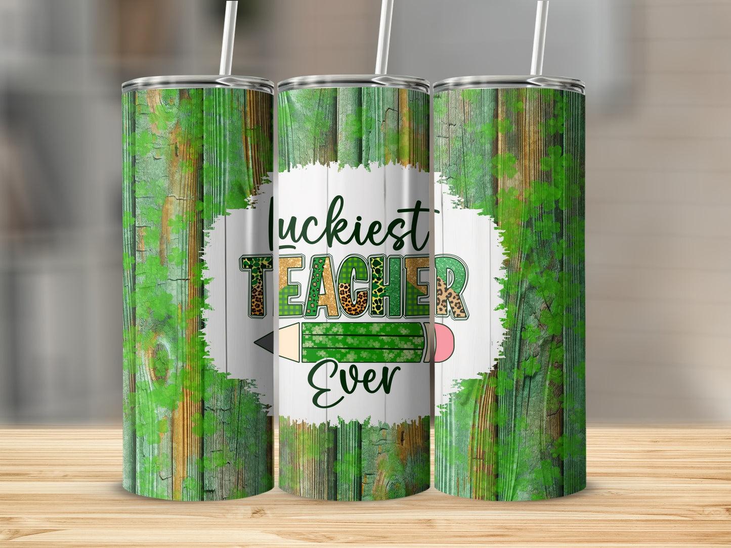 "Luckiest Teacher Ever" tumbler with green wood grain background.